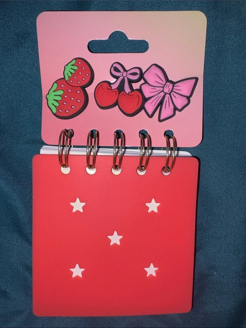 Cute croc-like charms with mini note pads sets.  Can be used on other stuff